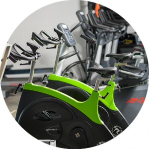Exercise bikes in a row